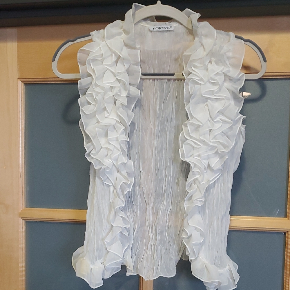 White Sleeveless Ruffled Bib Collar Blouse